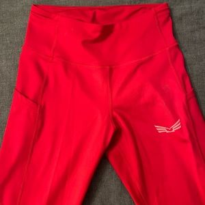 Body Kit Small Leggings, never worn, side pockets and back zipper pocket.